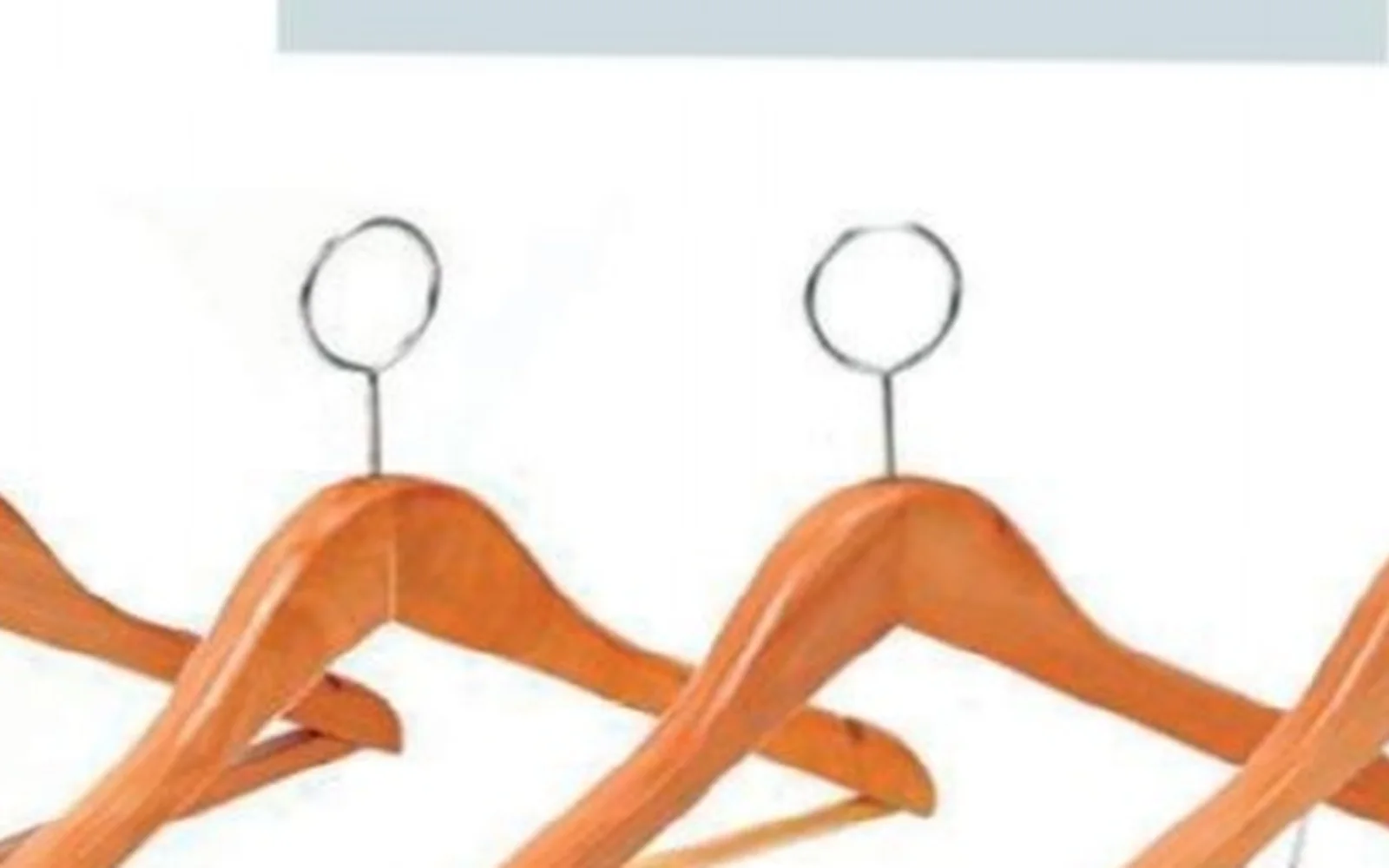 Wooden hotel wardrobe hangers from the George Group hotel supplies catalog